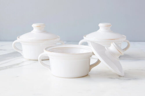 Set of exposed edge butter dishes with lids