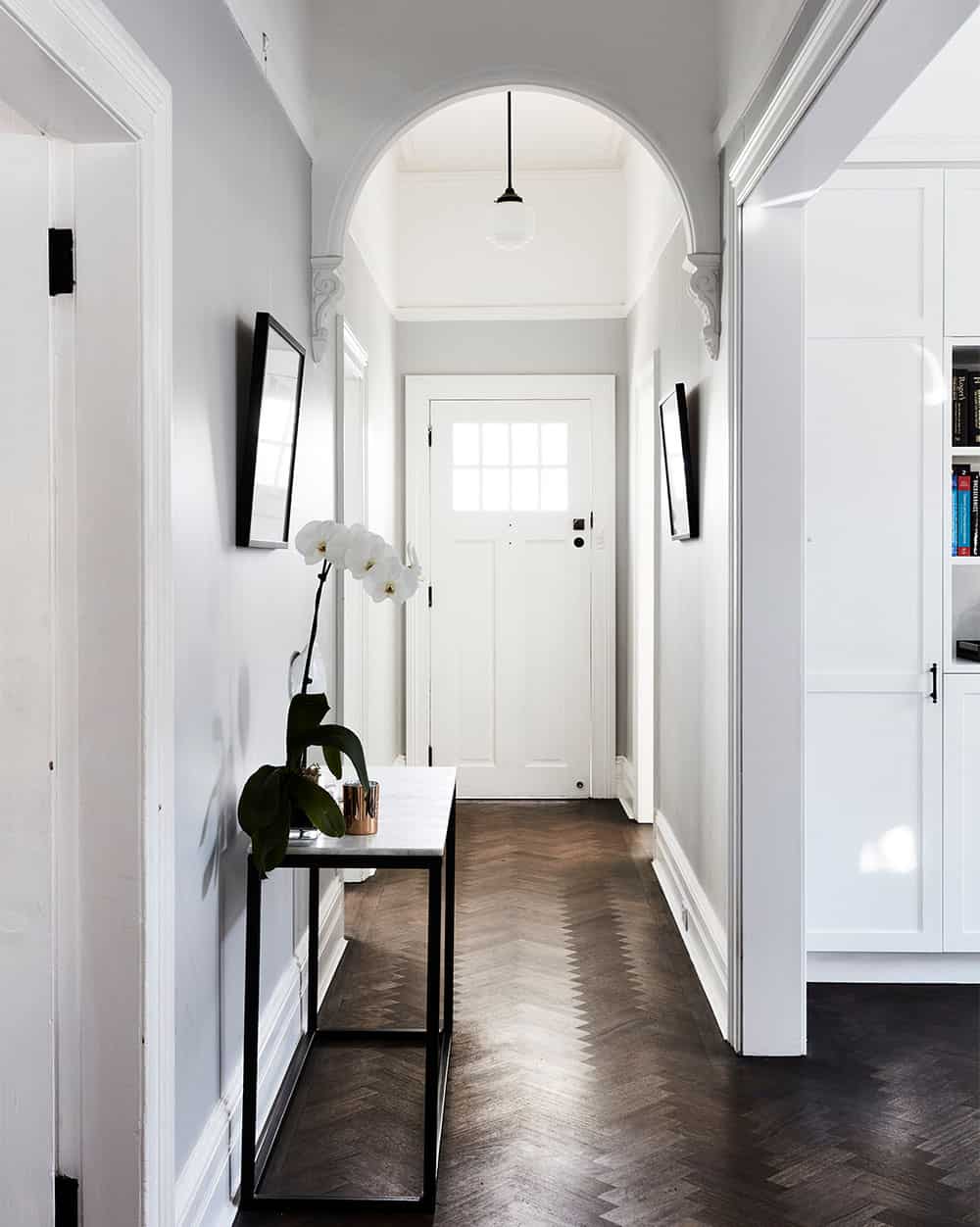 Newly renovated home with edwardian style foyer and hallway design